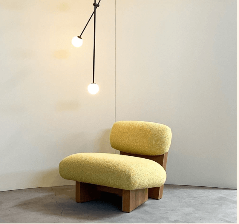 JIA CHAIR AND OTTOMAN par Atelier de Troupe